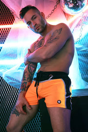BREEDWELL Swimwear AKIRA Blacklight UV Reflective Neon Orange Swim Shorts - SexyMenUnderwear.com